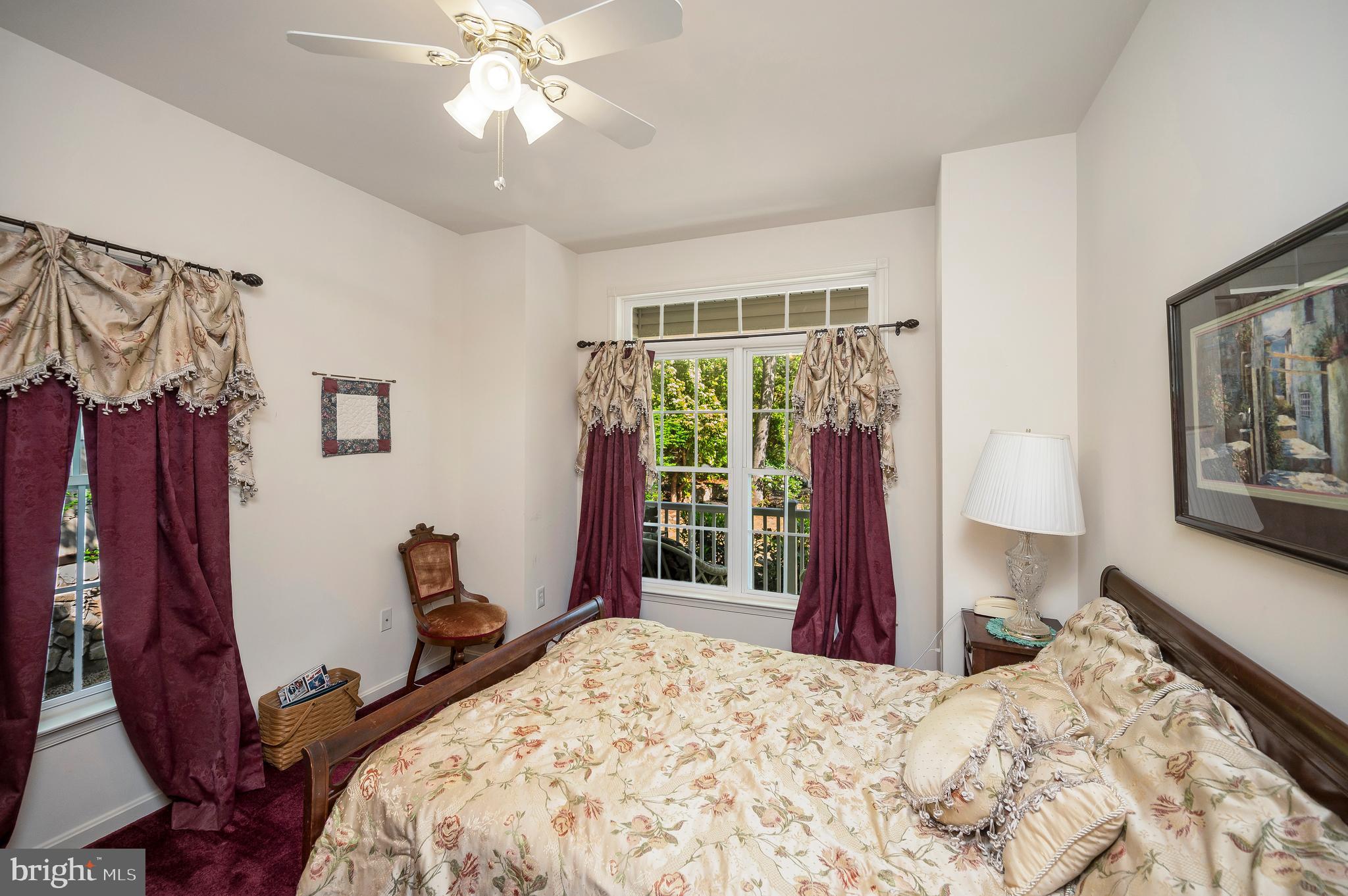 626 Cornwallis Avenue Locust Grove, VA 22508 - Photo 33 of 85 a bedroom with a bed and a large window
