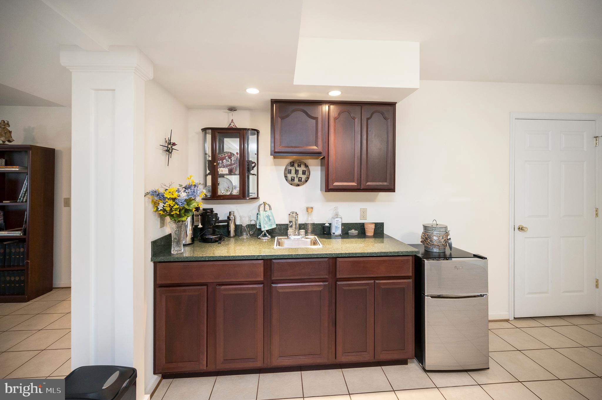 626 Cornwallis Avenue Locust Grove, VA 22508 - Photo 42 of 85 a kitchen with a sink and refrigerator