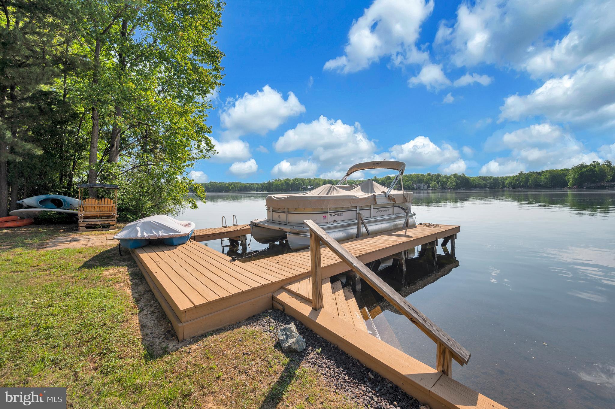 626 Cornwallis Avenue Locust Grove, VA 22508 - Photo 57 of 85 a view of a roof deck with couches and pool