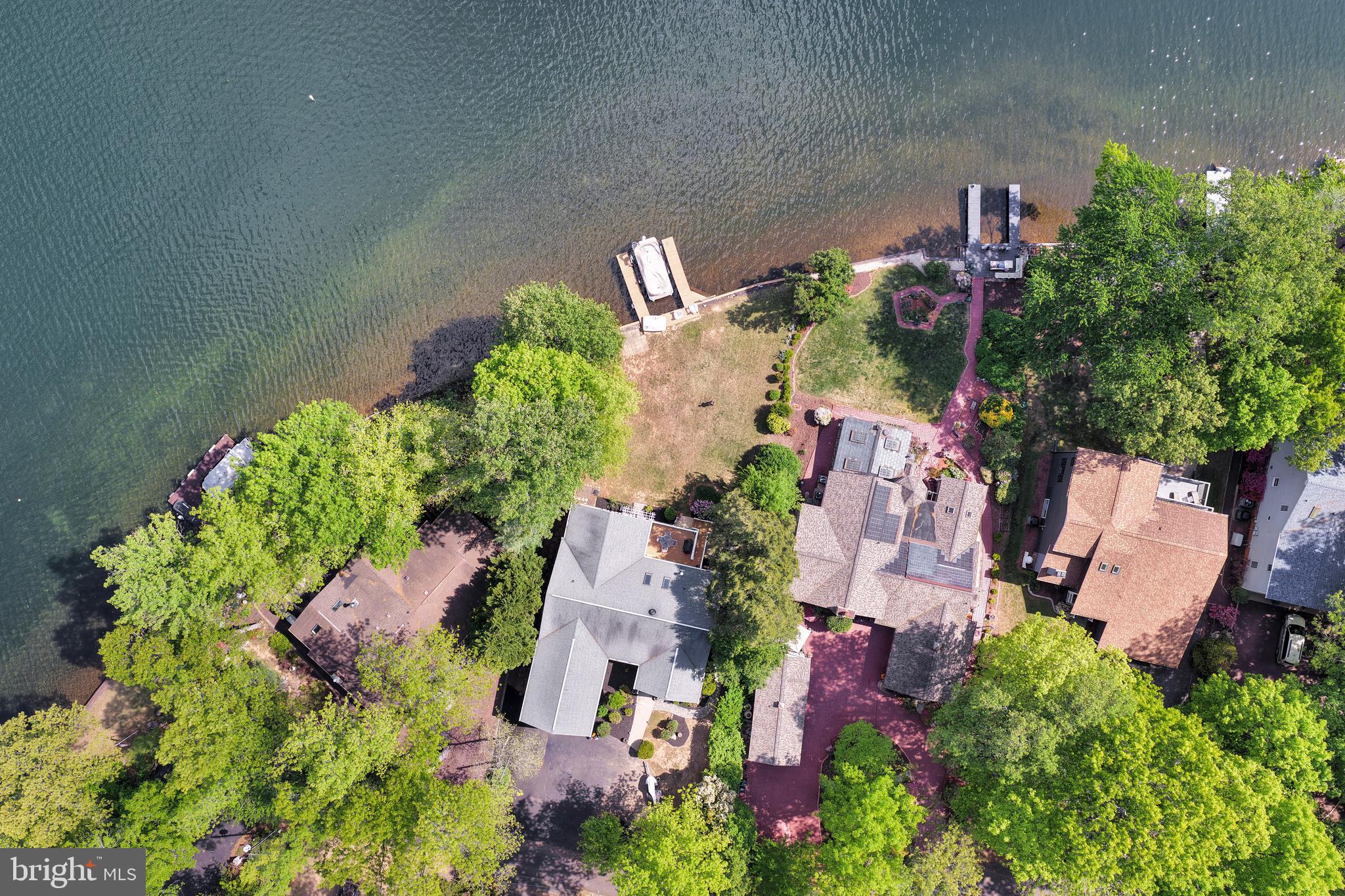 626 Cornwallis Avenue Locust Grove, VA 22508 - Photo 64 of 85 an aerial view of a house with a yard and garden