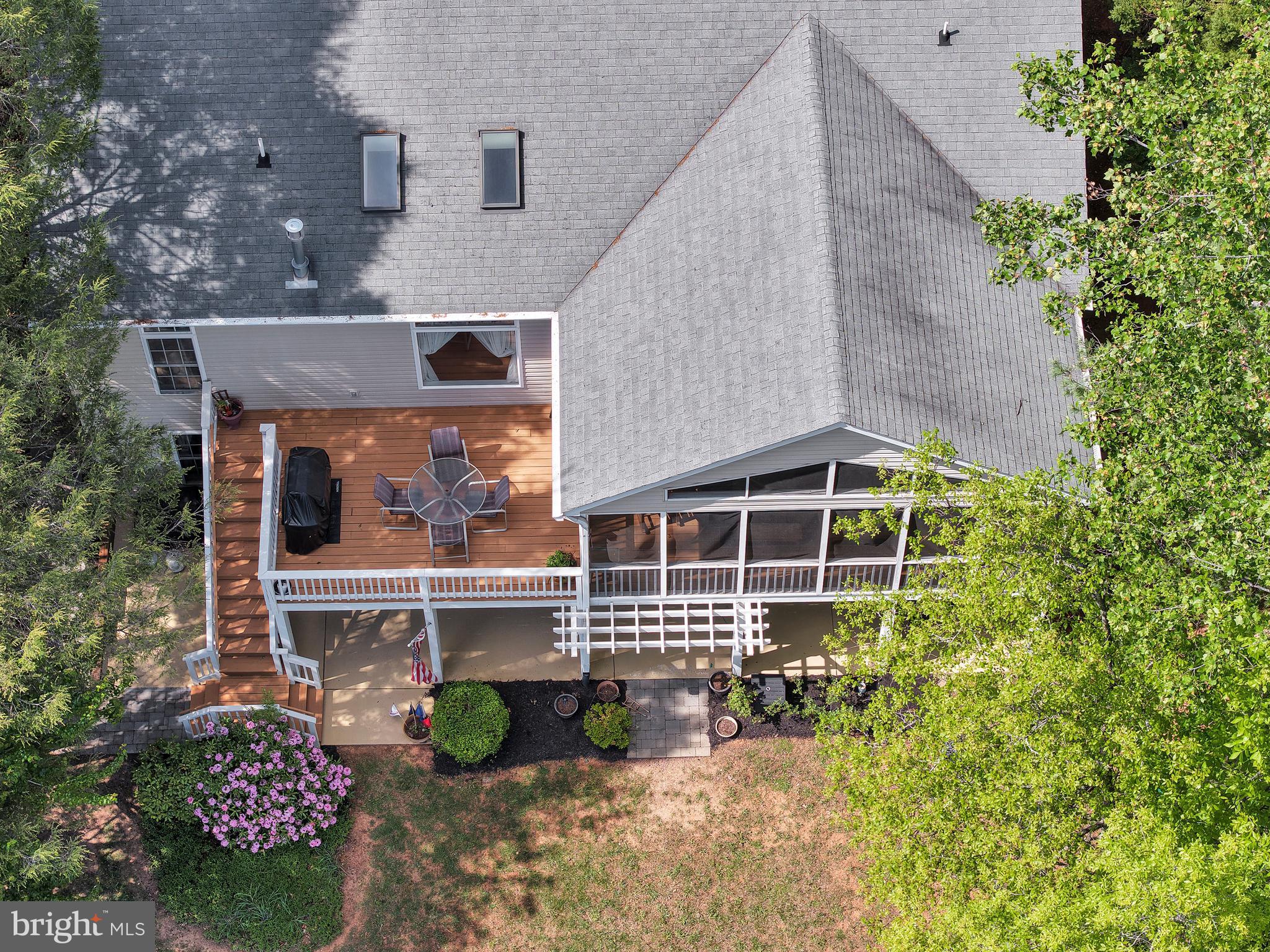 626 Cornwallis Avenue Locust Grove, VA 22508 - Photo 65 of 85 an aerial view of a house with a yard and potted plants