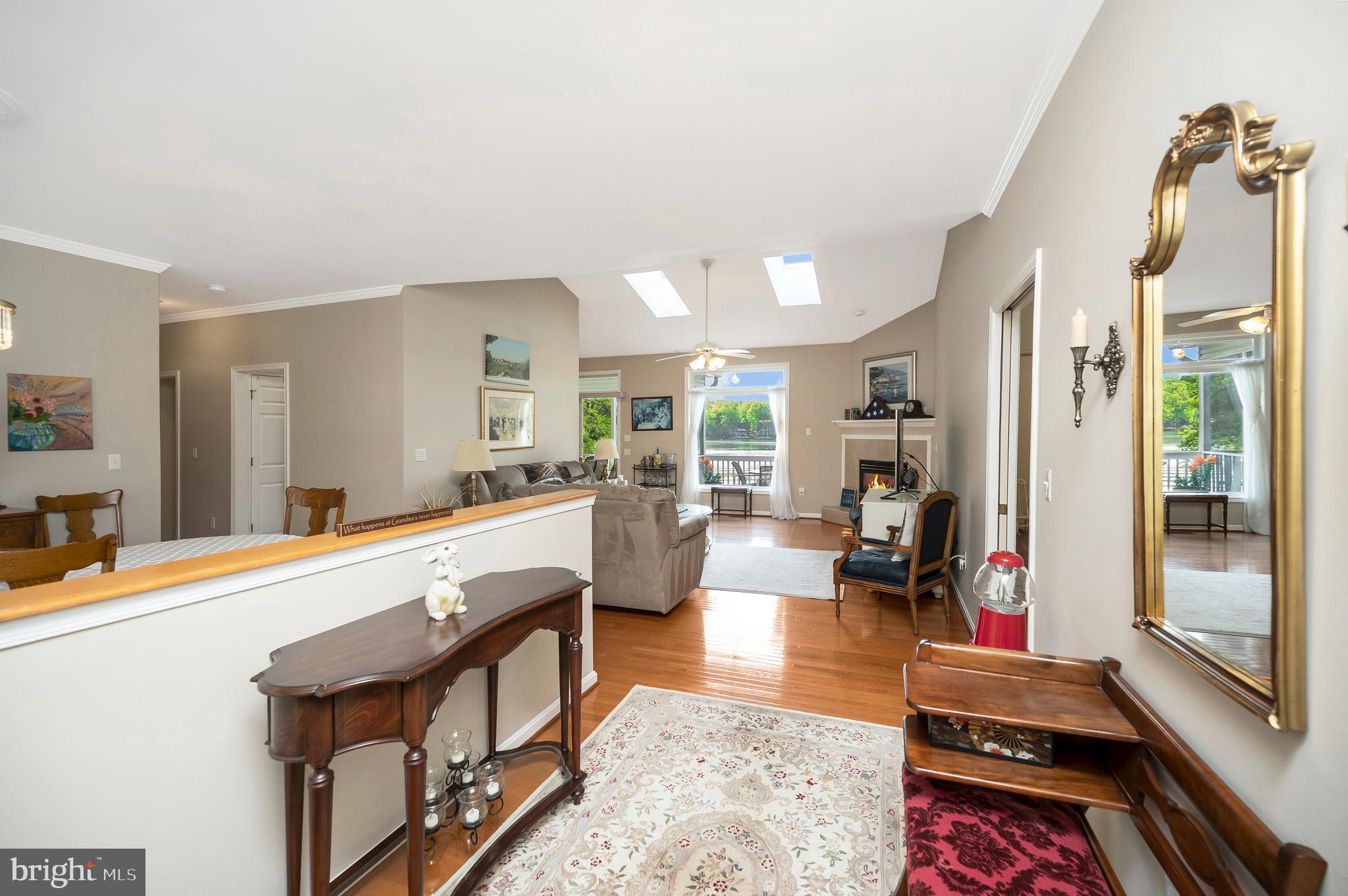 626 Cornwallis Avenue Locust Grove, VA 22508 - Photo 10 of 85 a large living room with stainless steel appliances kitchen island granite countertop furniture and a view of living room