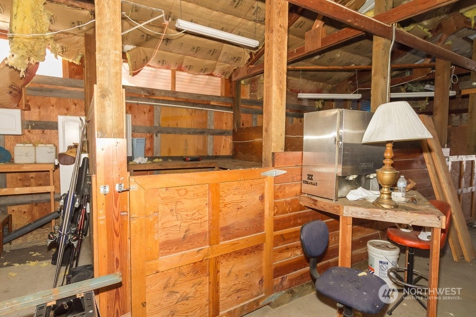 1144 State Rte 20 Colville, WA 99114 - Photo 8 of 38 a room with furniture and a window