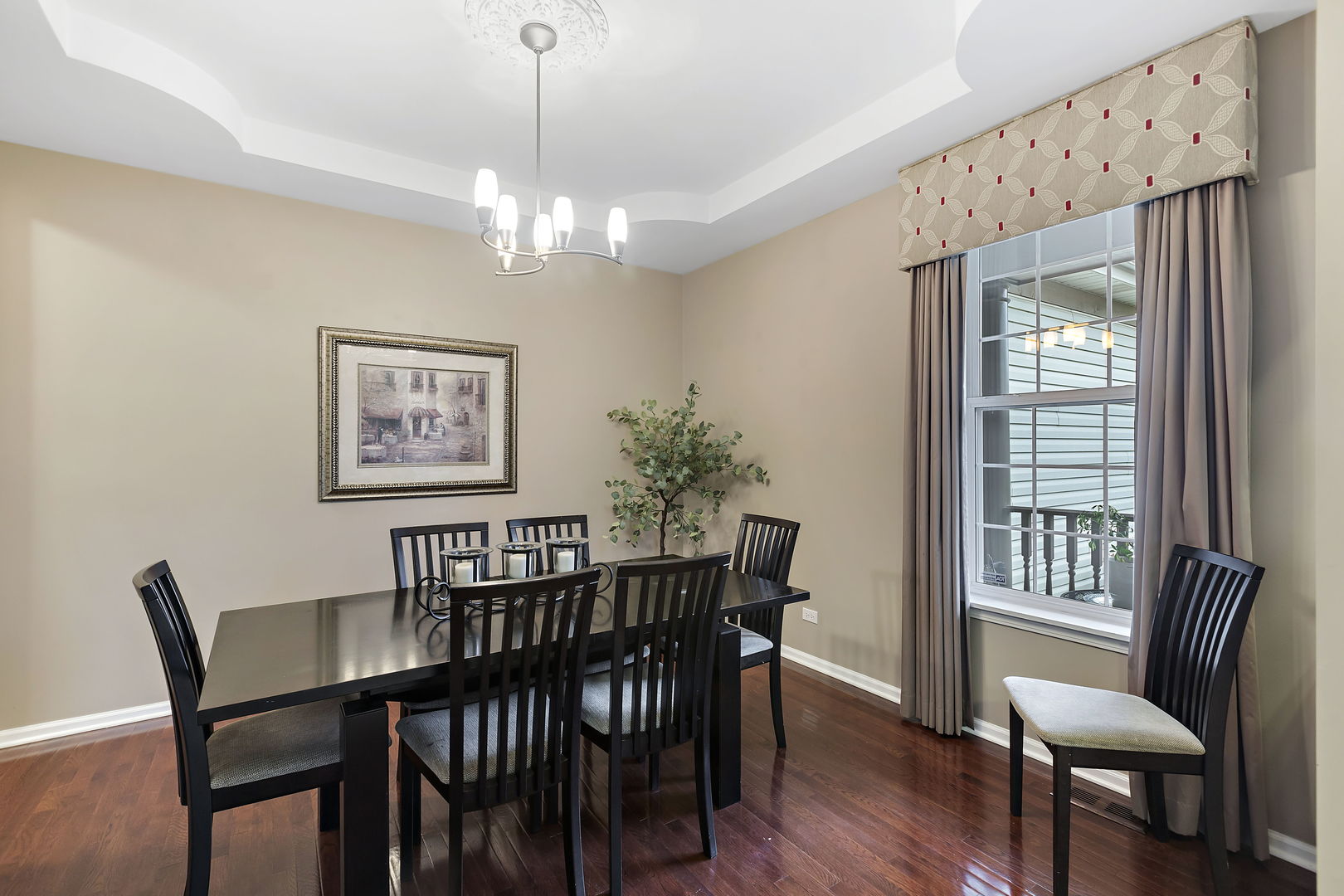 1591 Southgate Road Bartlett, IL 60103 - Photo 3 of 42 a view of a dining room with furniture window and wooden floor