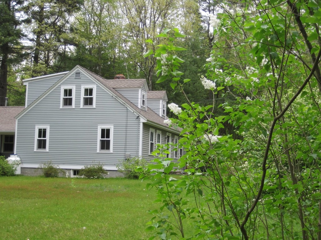 16 Juggler Meadow Road Leverett, MA 01054 - Photo 29 of 29 a front view of a house with a garden