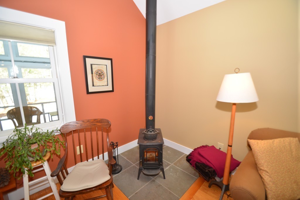 16 Juggler Meadow Road Leverett, MA 01054 - Photo 8 of 29 a living room with furniture and a lamp