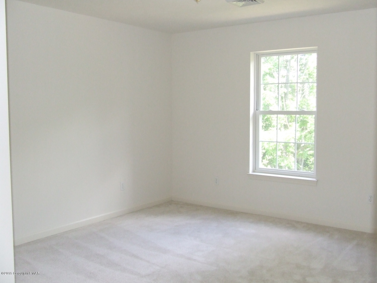 2317 Clover Road Long Pond, PA 18334 - Photo 14 of 14 an empty room with a window