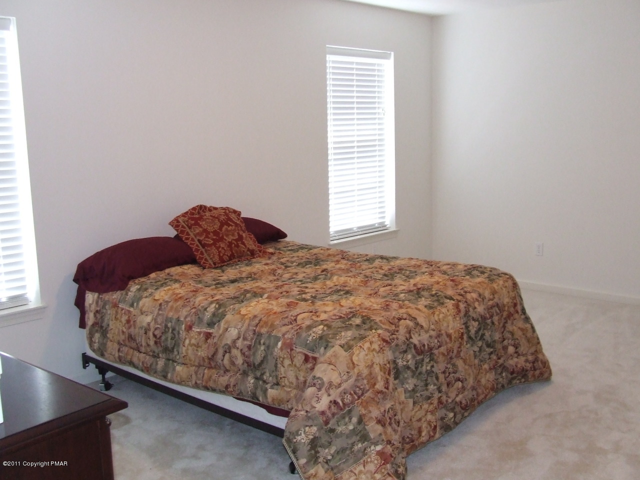 2317 Clover Road Long Pond, PA 18334 - Photo 10 of 14 a bedroom with a bed and window
