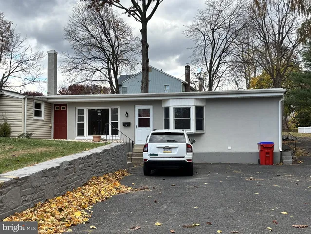 a car parked in front of a house