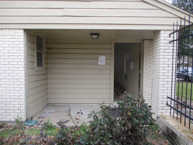 a front view of a house with a garage