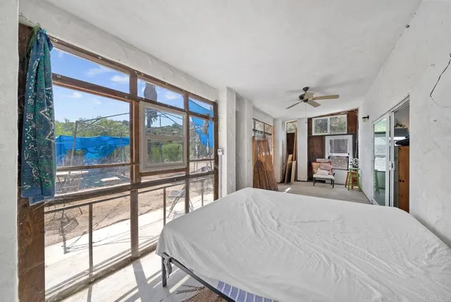 a large kitchen with stainless steel appliances granite countertop a lot of counter space and wooden floor
