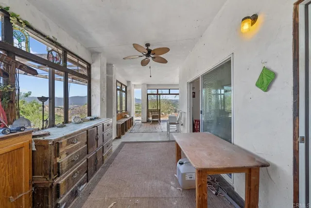 a view of a city with mountains in the background