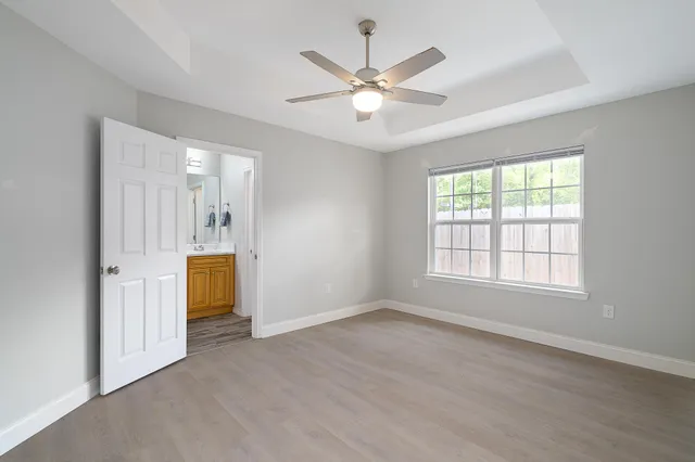 a view of an empty room with a window
