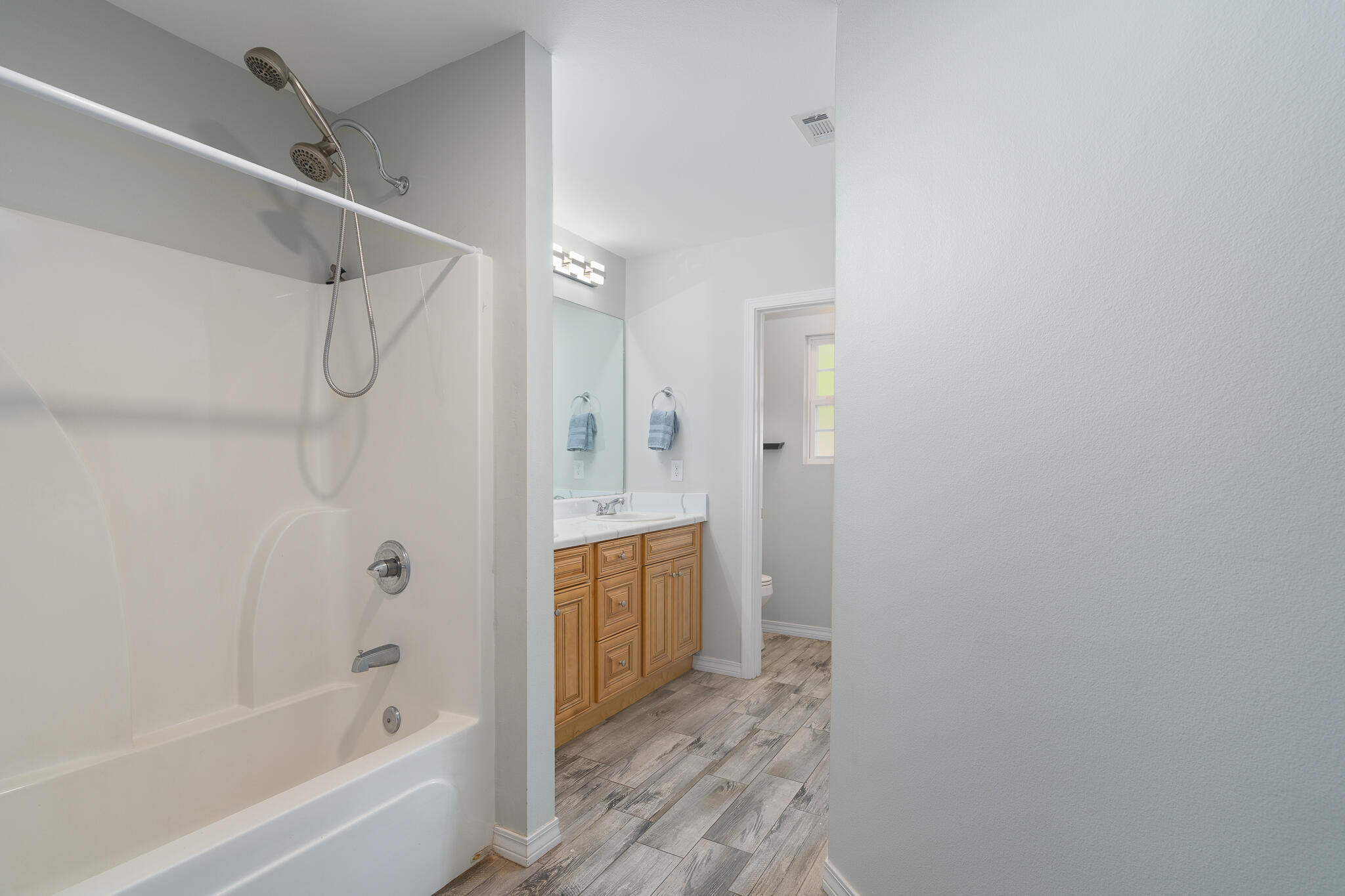 202 Mc Arthur Street Crestview, FL 32539 - Photo 21 of 39 a bathroom with a bathtub and shower