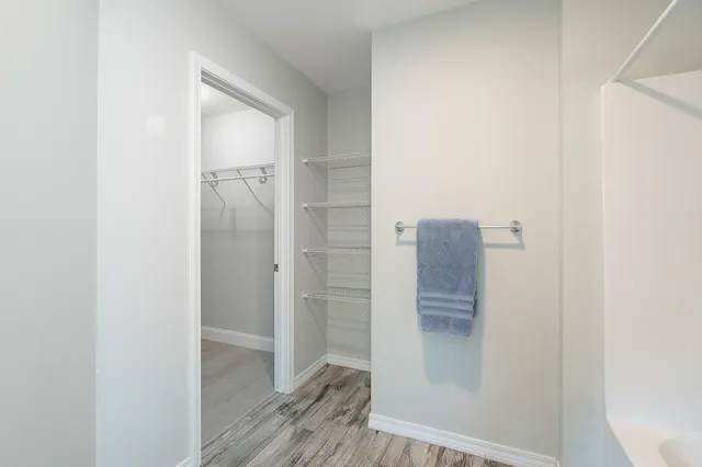 a bedroom with a bed and furniture