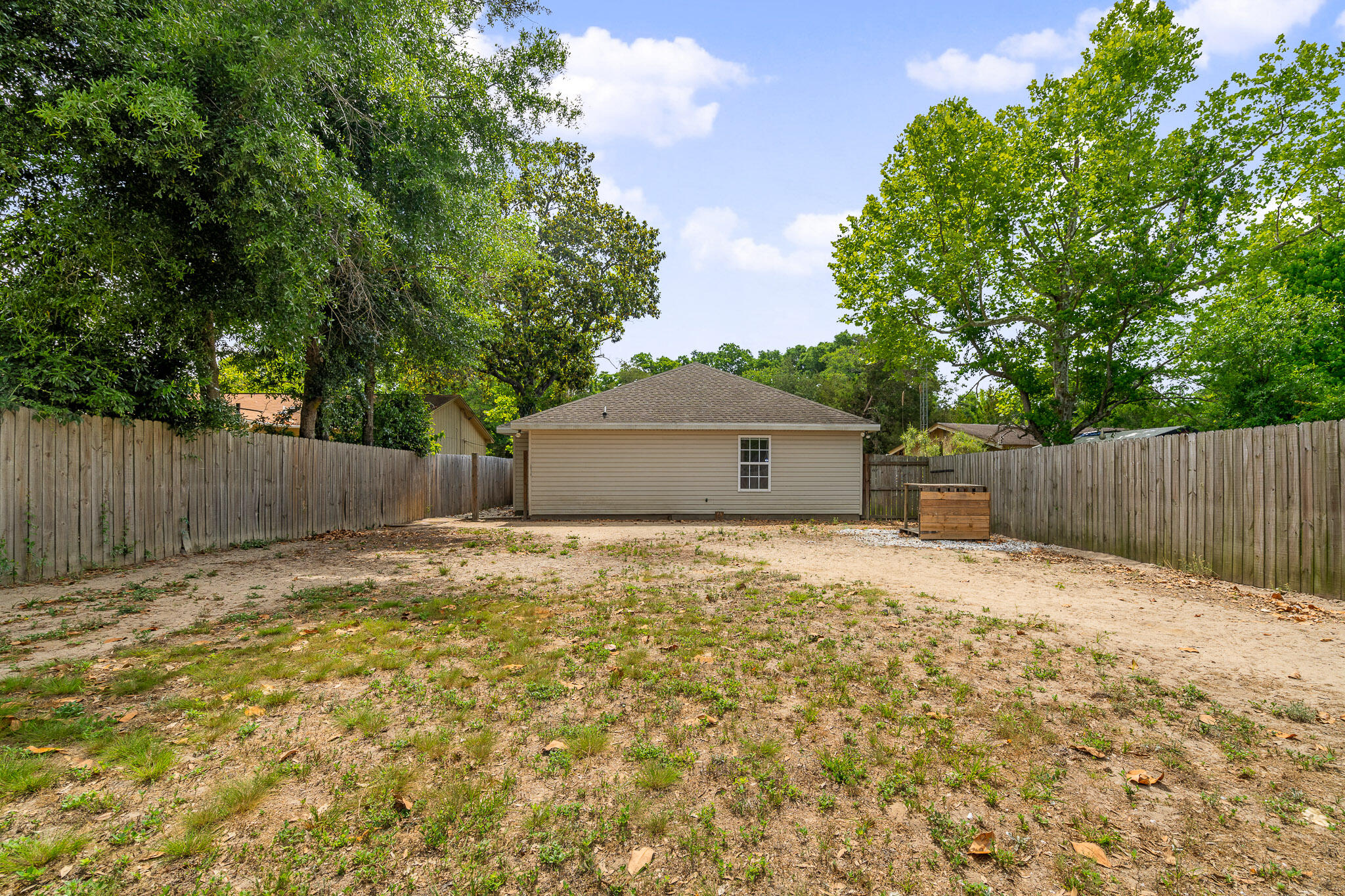 202 Mc Arthur Street Crestview, FL 32539 - Photo 35 of 39 a backyard of a house