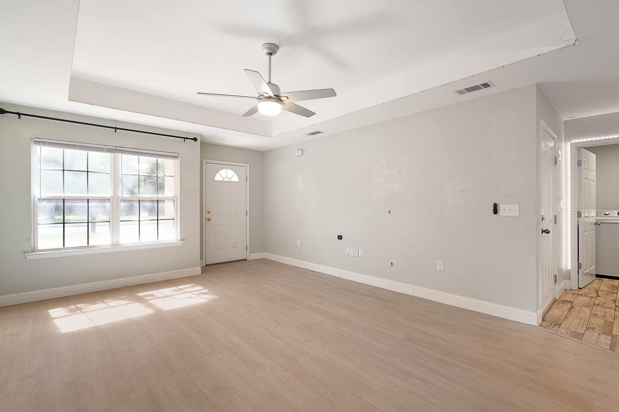202 Mc Arthur Street Crestview, FL 32539 - Photo 7 of 39 a view of an empty room with a window