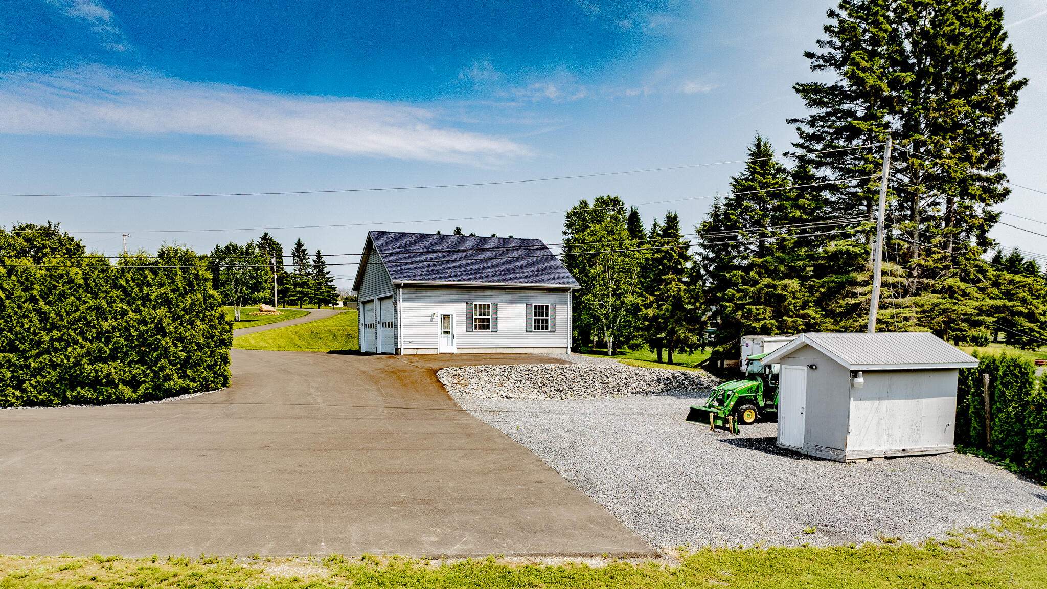 149-161 Lake Shore Road, Unit LOT 202 St. David, ME 04773 - Photo 59 of 62 Detached garage and shed