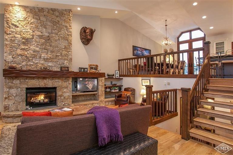 355 Offerson Road, Unit P3 Beaver Creek, CO 81620 - Photo 3 of 25 Expansive floor to ceiling rock fireplac