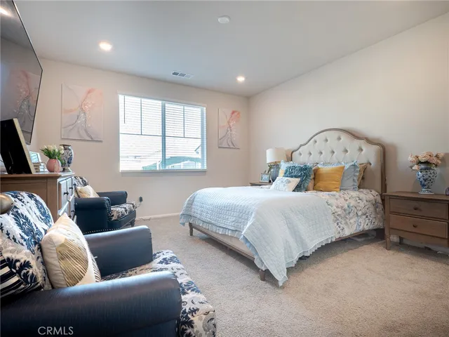 a bathroom with a sink a mirror and a toilet