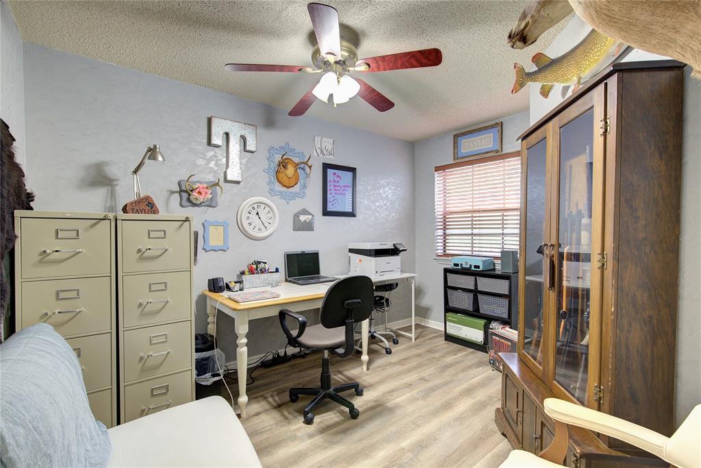 753 County Rd SW 3110 Mount Vernon, TX 75457 - Photo 23 of 40 This room tucked between the upstairs primary bedroom and its ensuite bathroom can be used as an office, nursery or hobby space.