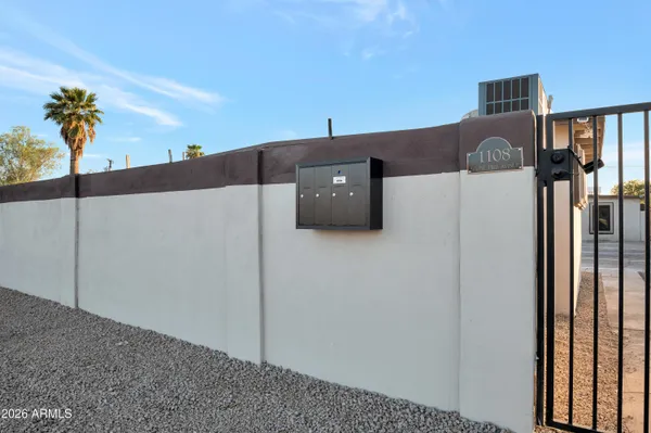 a view of a livingroom with furniture and cabinet