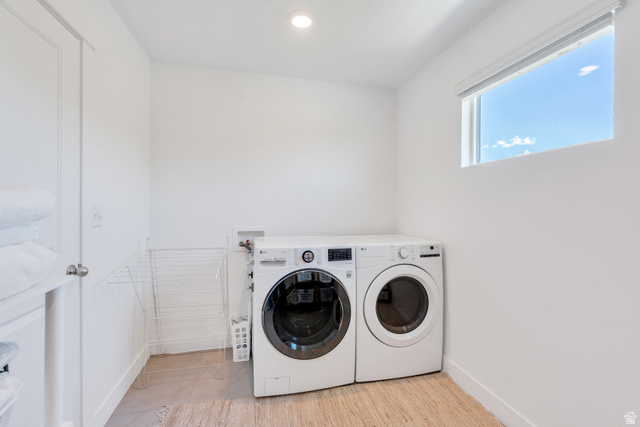 646 South Meade Street Mapleton, UT 84664 - Photo 21 of 46 Dedicated laundry area featuring a front-load washer and dryer, recessed lighting, and a single window