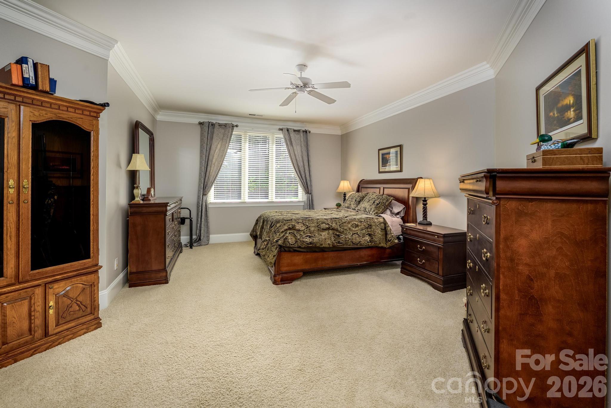 7315 Bay Ridge Drive Denver, NC 28037 - Photo 20 of 39 a bedroom with bed and window