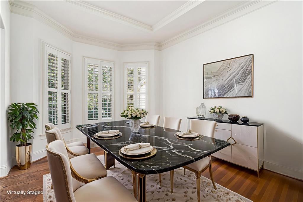 3301 Chastain Ridge Drive Marietta, GA 30066 - Photo 15 of 50 a view of a dining room with furniture window and wooden floor