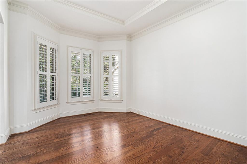 3301 Chastain Ridge Drive Marietta, GA 30066 - Photo 18 of 50 an empty room with wooden floor and windows