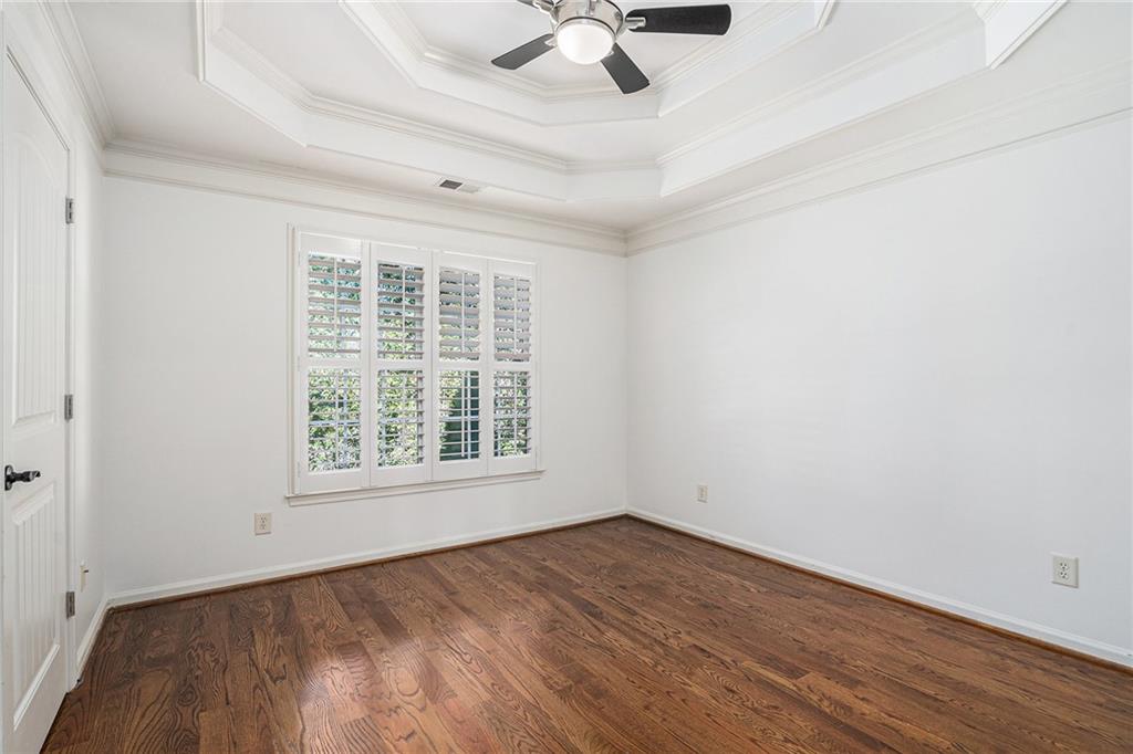 3301 Chastain Ridge Drive Marietta, GA 30066 - Photo 27 of 50 an empty room with a window and a fan