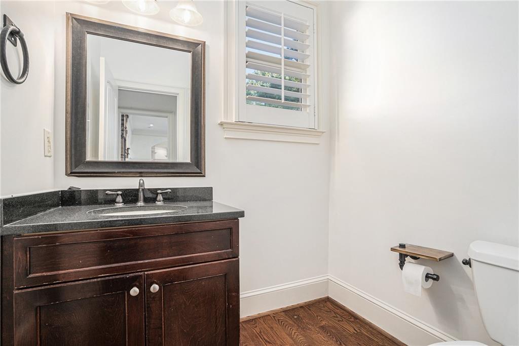 3301 Chastain Ridge Drive Marietta, GA 30066 - Photo 29 of 50 a bathroom with a sink and a mirror