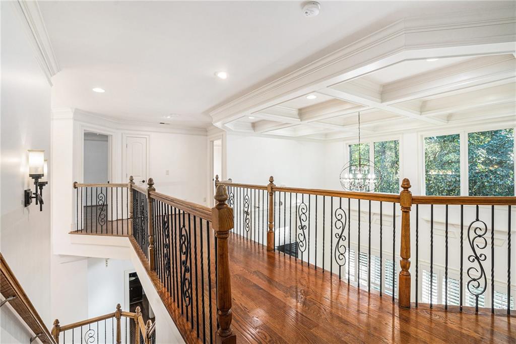 3301 Chastain Ridge Drive Marietta, GA 30066 - Photo 30 of 50 a view of a hallway with wooden floor and windows