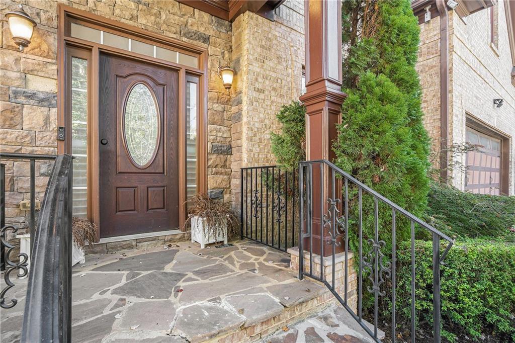 3301 Chastain Ridge Drive Marietta, GA 30066 - Photo 4 of 50 a view of a house with a door and balcony