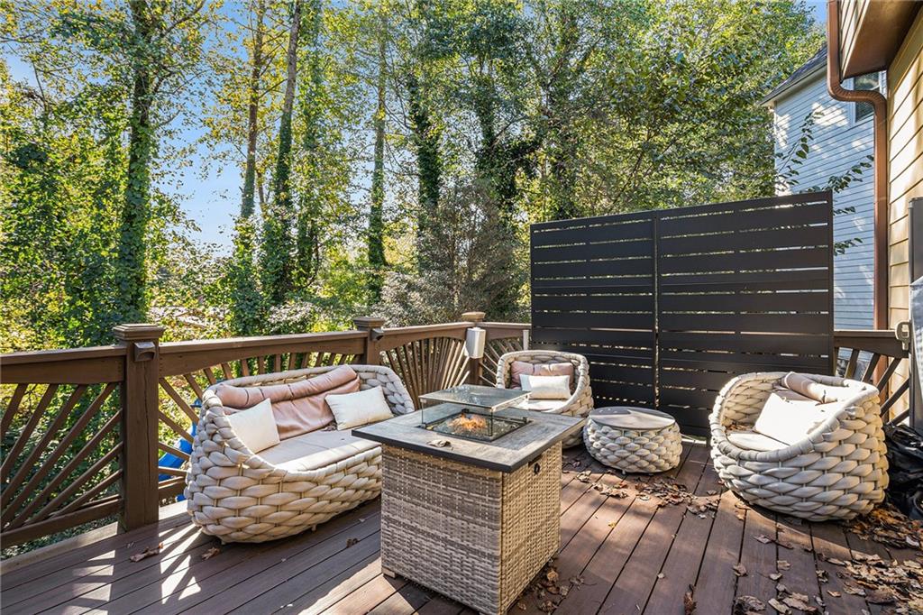 3301 Chastain Ridge Drive Marietta, GA 30066 - Photo 45 of 50 a balcony with wooden floor and outdoor seating