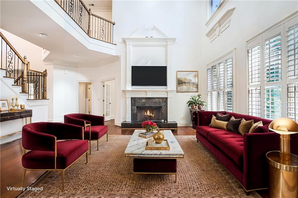 3301 Chastain Ridge Drive Marietta, GA 30066 - Photo 6 of 50 a living room with furniture fireplace and flat screen tv