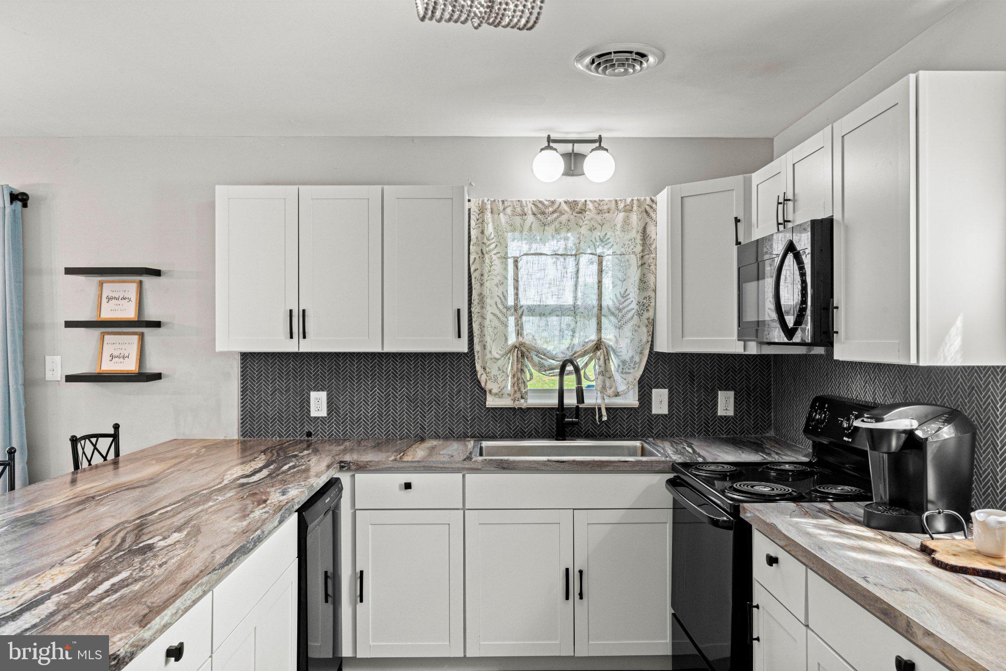 236 Ridge Hill Road Mechanicsburg, PA 17050 - Photo 15 of 36 Modern kitchen with sleek finishes.