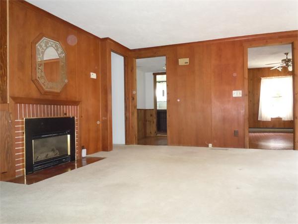 29 Putnam Road Sturbridge, MA 01566 - Photo 3 of 19 a view of a livingroom with a fireplace
