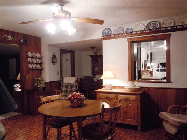 29 Putnam Road Sturbridge, MA 01566 - Photo 7 of 19 a view of a dining room with furniture and wooden floor