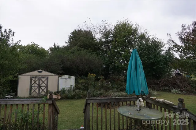 a view of a lake with a house in the background