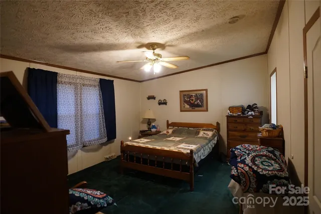 a very nice looking bedroom with a bed