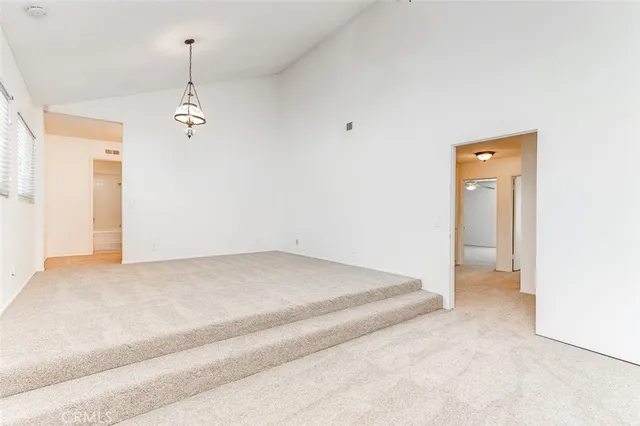 a view of empty room with windows