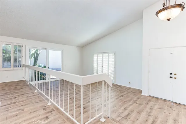 a potted plant sitting on the side of a brick building