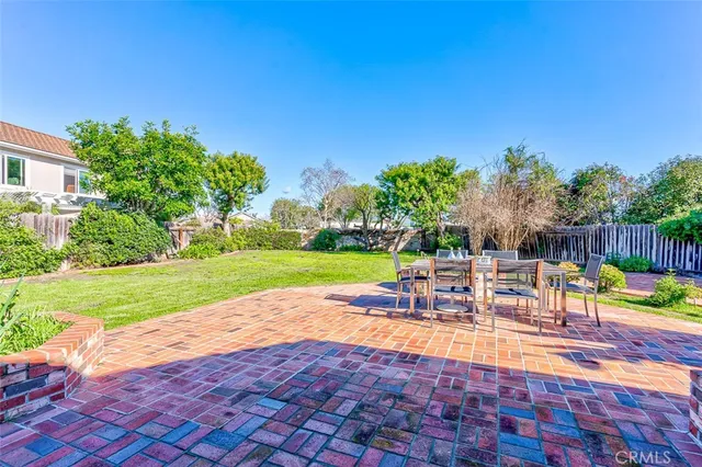a view of a backyard with a garden