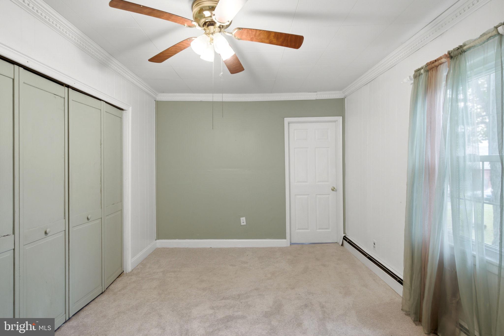 2197 Mauzy Road Berkeley Springs, WV 25411 - Photo 31 of 119 Bedroom with access to main full bath