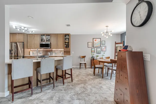 a bedroom with a bed window and a desk