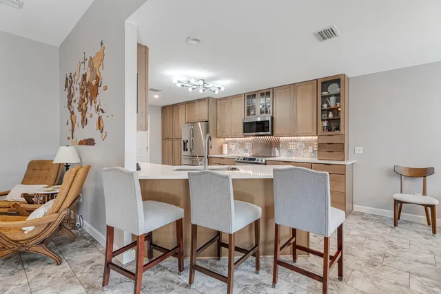 a bedroom with bed and a window