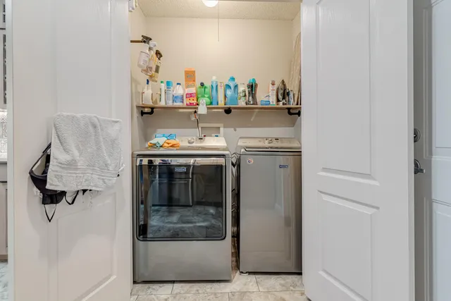 a house view with a backyard space