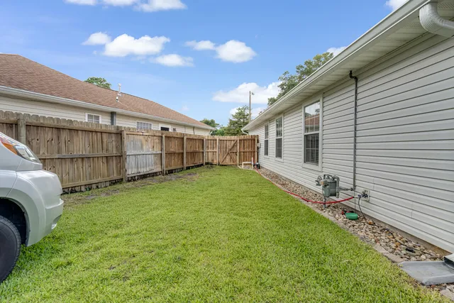 a view of a street with a park