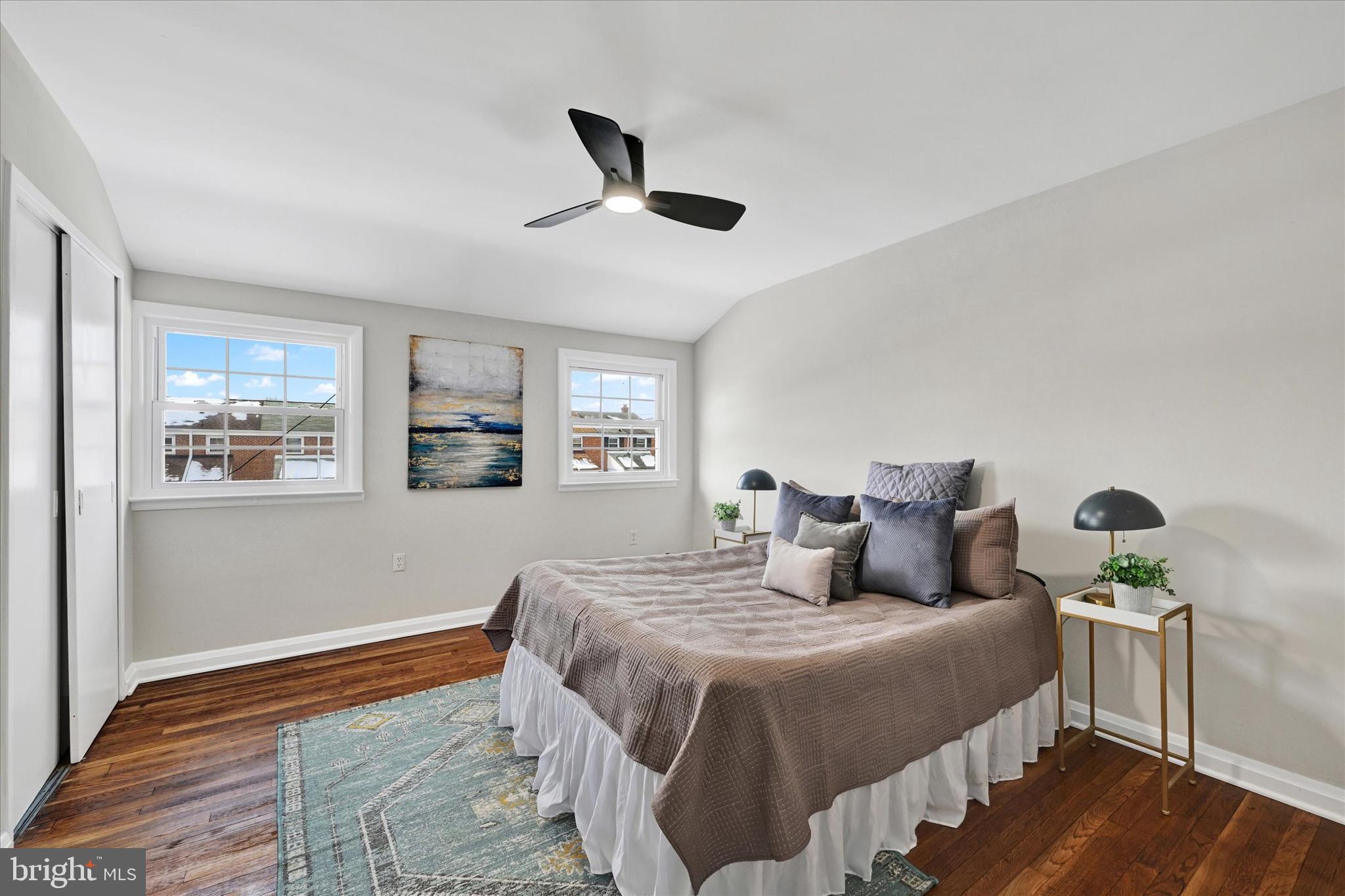 1945 Ormand Road Baltimore, MD 21222 - Photo 12 of 28 a bedroom with a bed and wooden floor
